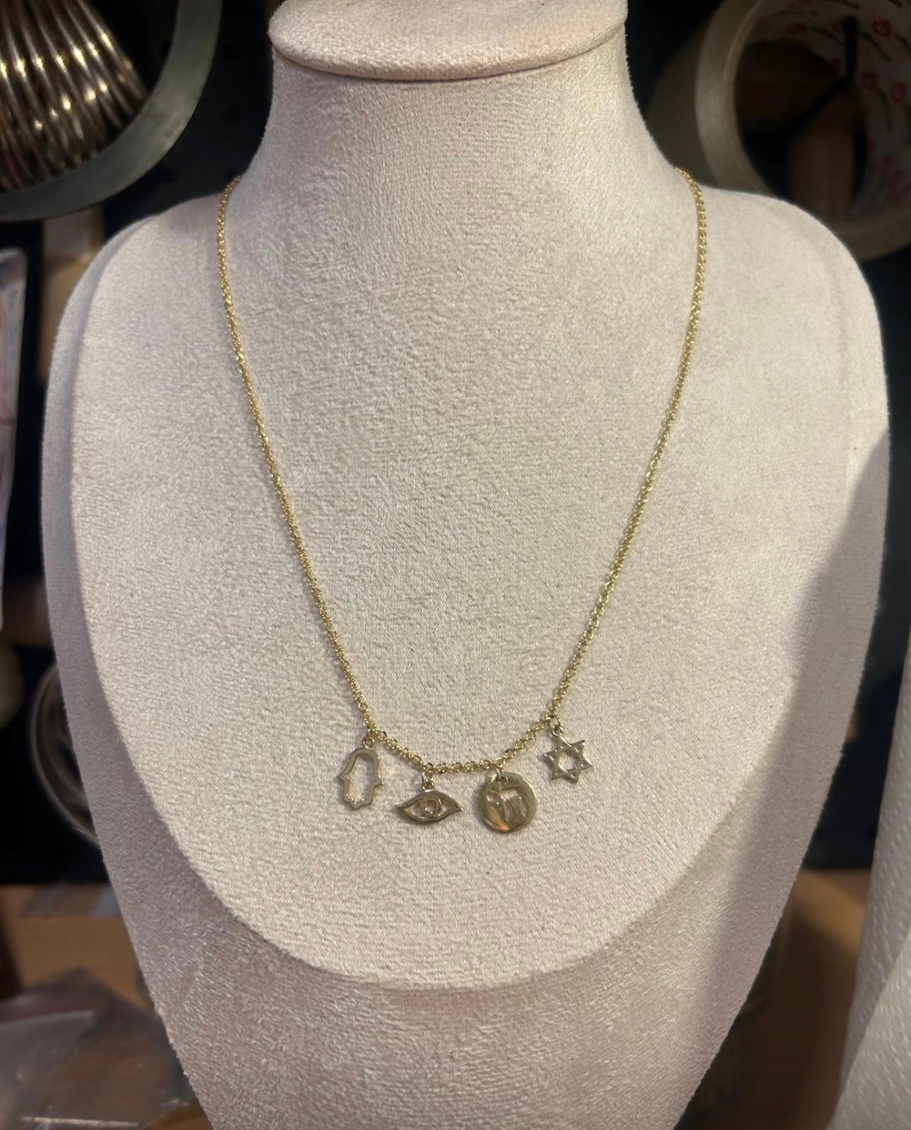 14 carrot gold necklace with charms.